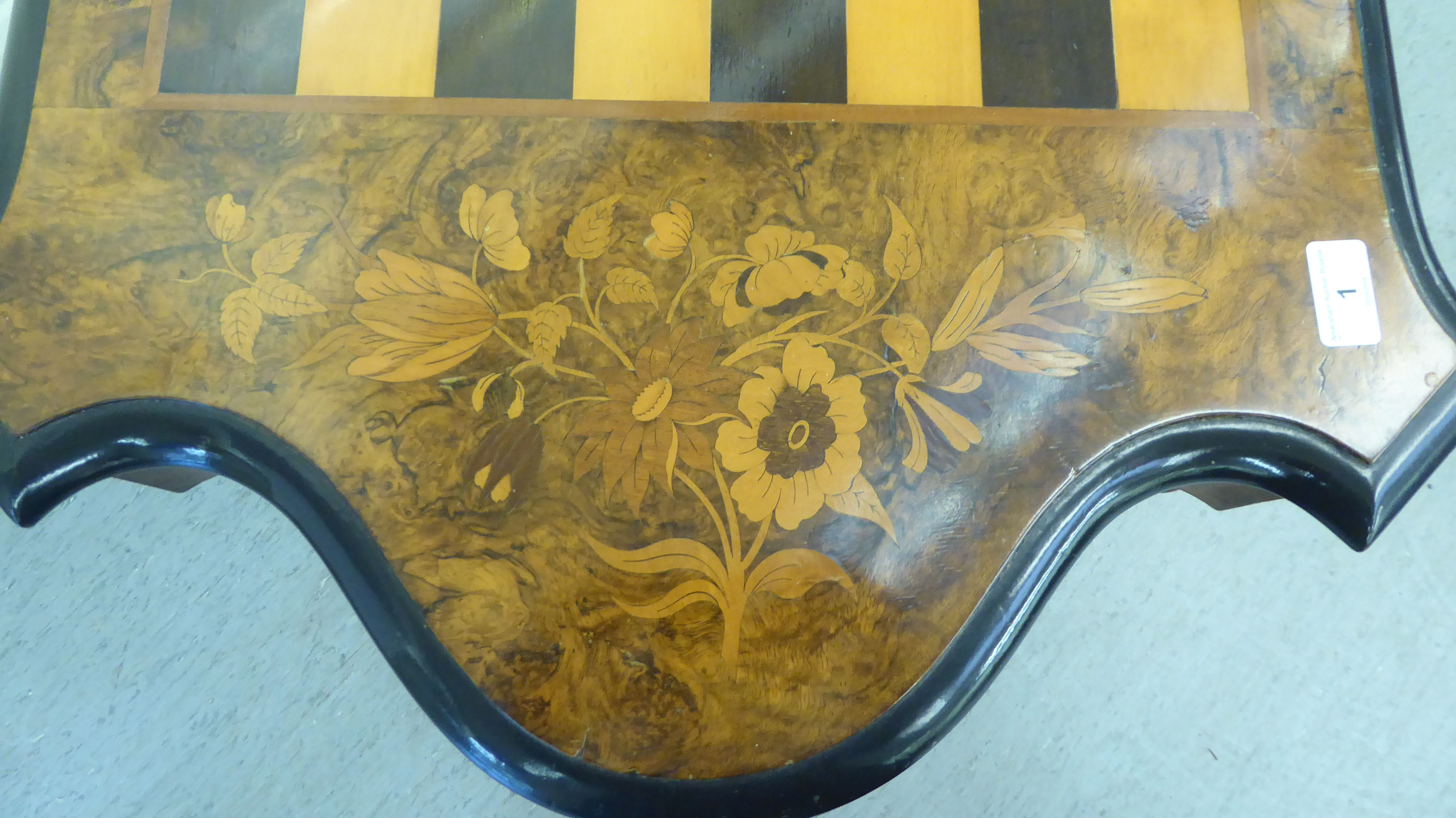 A late 19thC Continental figured walnut and floral marquetry games table with a serpentine - Image 12 of 12