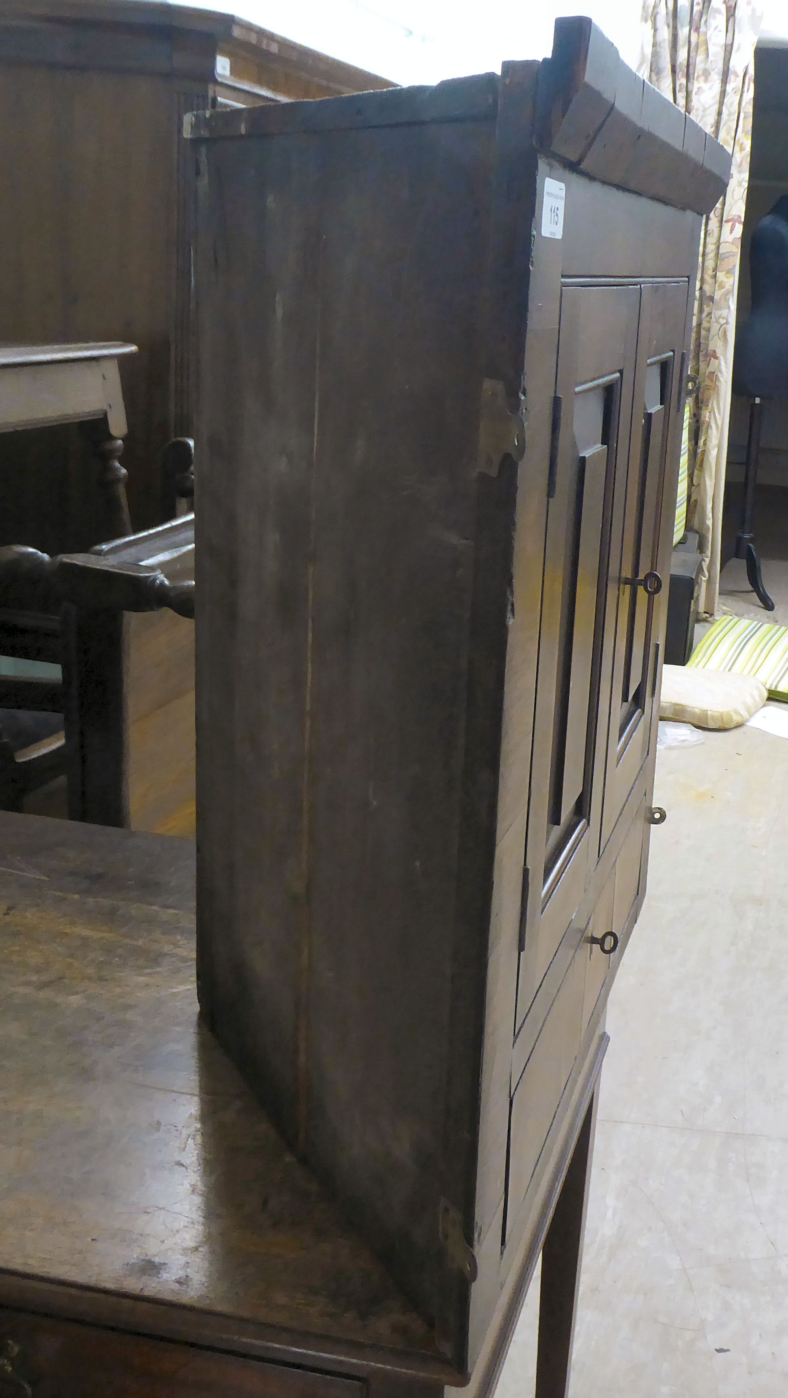 An early 19thC Georgian mahogany hanging corner cupboard with two fielded panelled doors, over a - Image 2 of 4