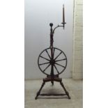 A late Victorian walnut spinning wheel  46"h  (completeness not guaranteed)