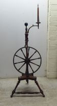A late Victorian walnut spinning wheel  46"h  (completeness not guaranteed)