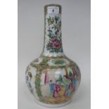 A late 19thC Chinese Canton porcelain bulbous bottle vase with a long, narrow and tapered neck,