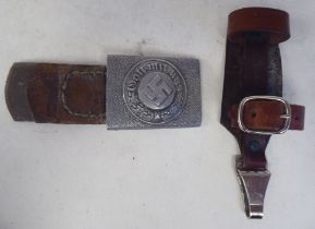 A German Third Reich era military belt buckle; and a buckled brown hide dagger strap (Please Note: