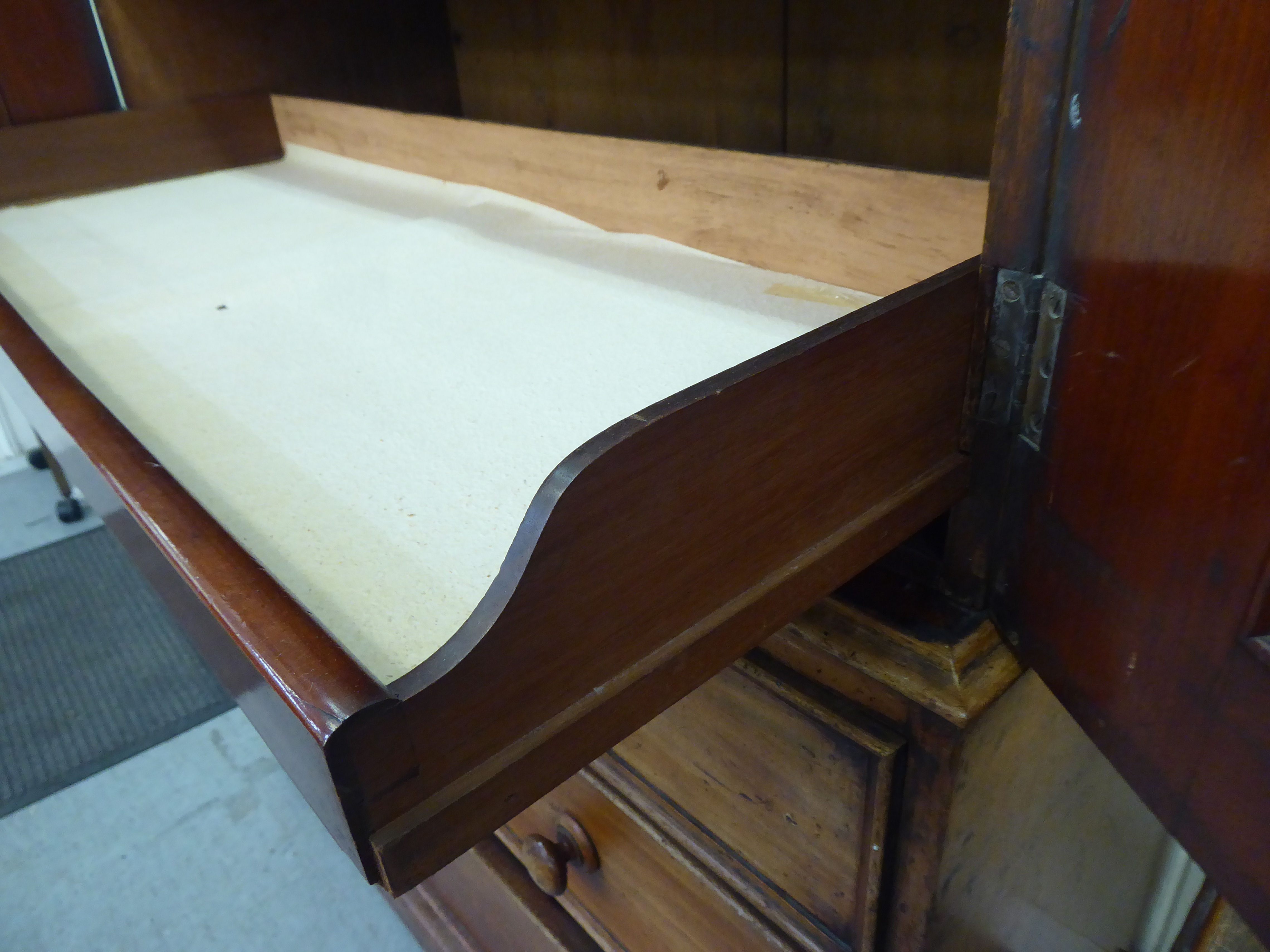 A mid Victorian mahogany linen press (cornice missing) with a pair of doors, enclosing four drawers, - Image 3 of 5