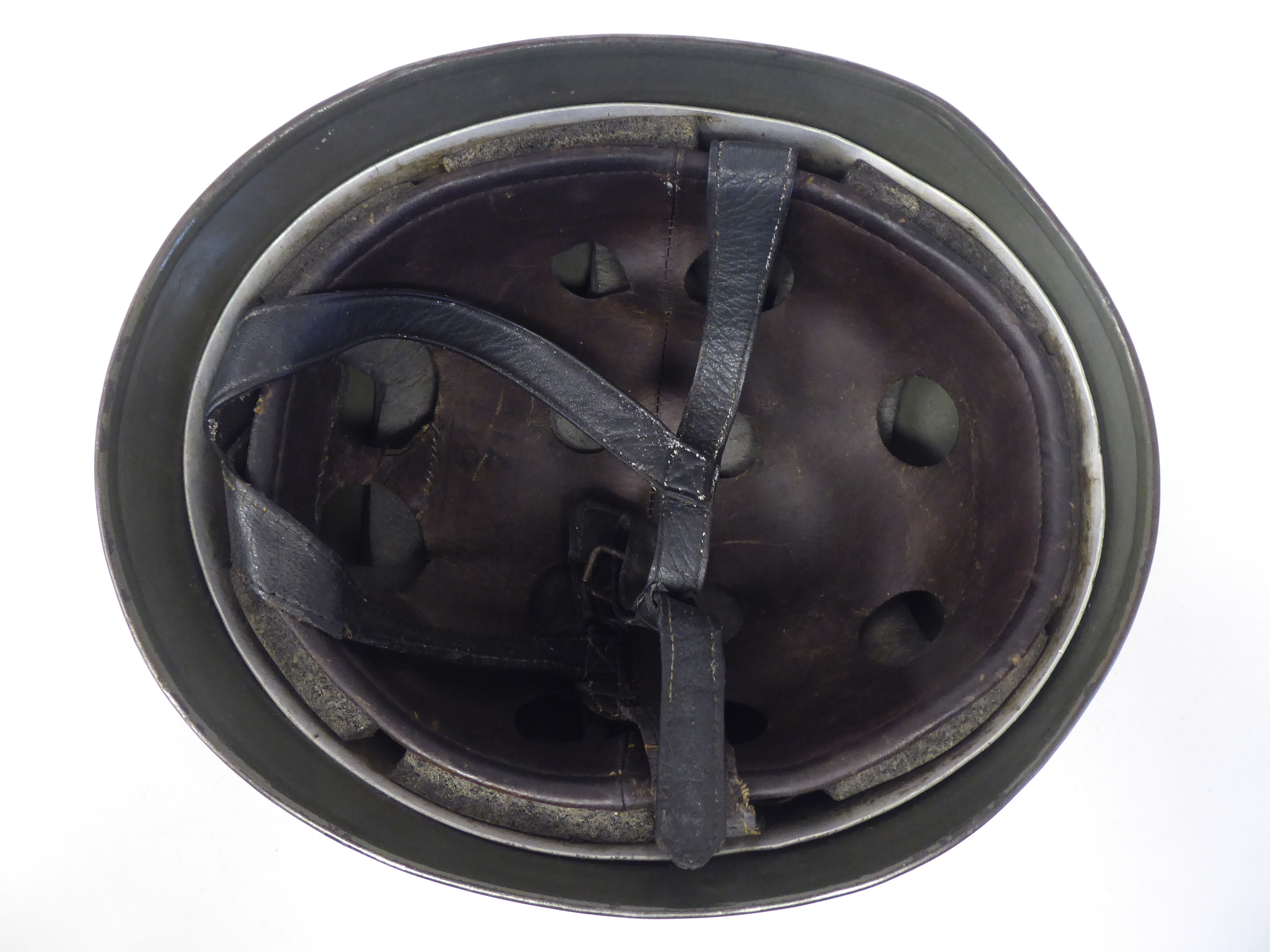 A German World War II Luftwaffe parachutist's steel helmet with a hide liner, harness strap and - Bild 4 aus 4