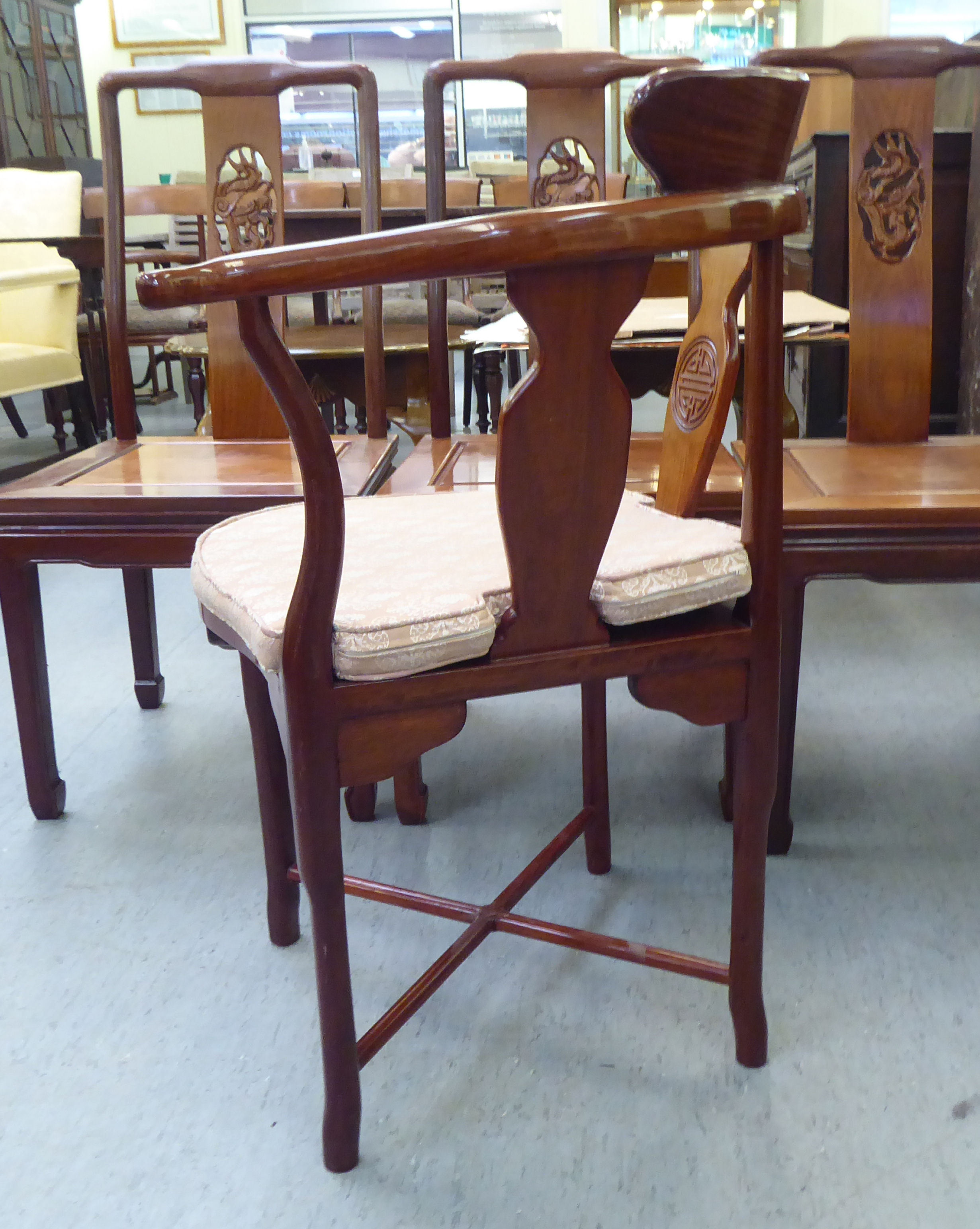 A set of seven modern Chinese, rosewood framed dining chairs, each with a dragon carved splat, - Image 5 of 5