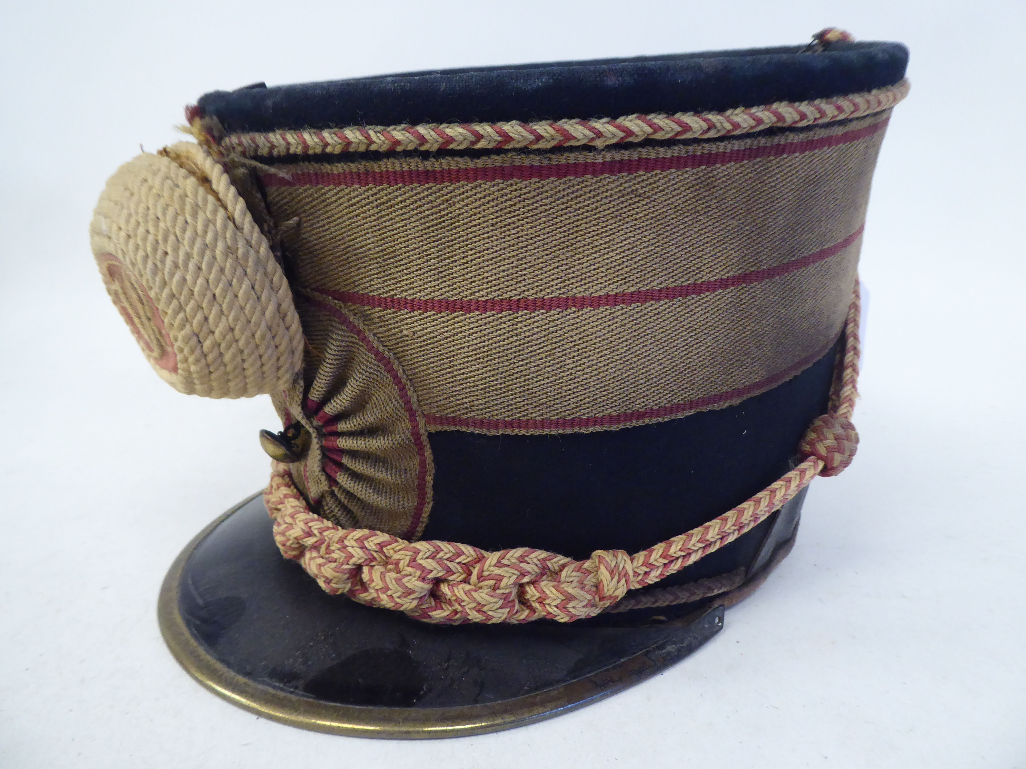 A mid 19thC Gloucestershire Hussars shako with a hide liner (Please Note: this lot is subject to the