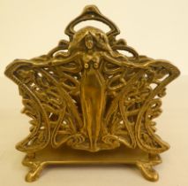 An Art Nouveau lacquered brass, two section letter rack, decorated with a woman  6.5"h