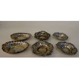 Three pairs of various small, impressed and pierced sweet dishes of circular, oval and heart design