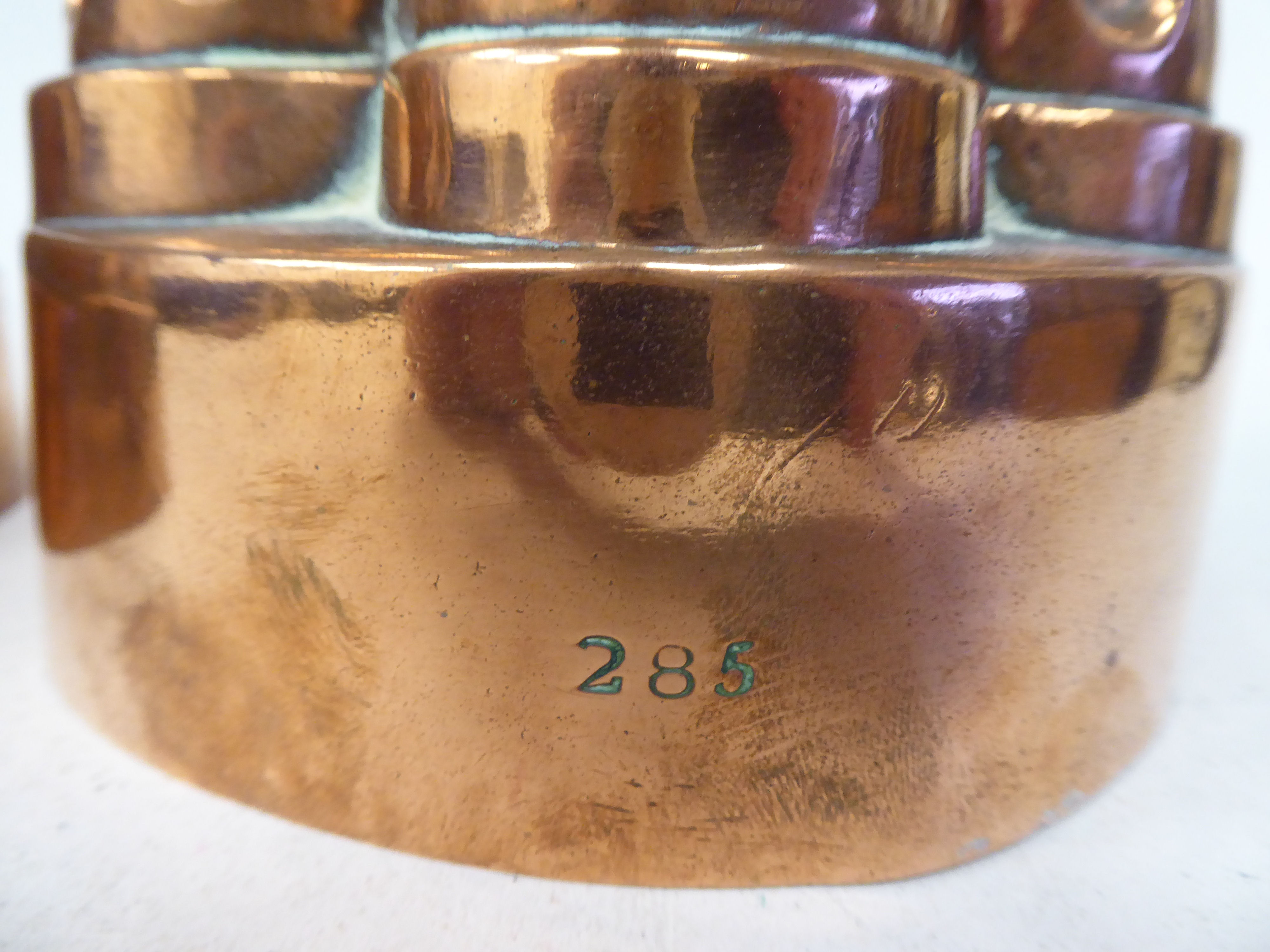 A 19thC copper, circular jelly mould of circular turret design  5"dia; and another, similar  5.25" - Image 3 of 3