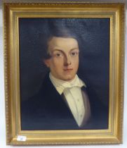 Early/mid 19thC British School - a head and shoulders portrait, a young man wearing a topcoat  oil