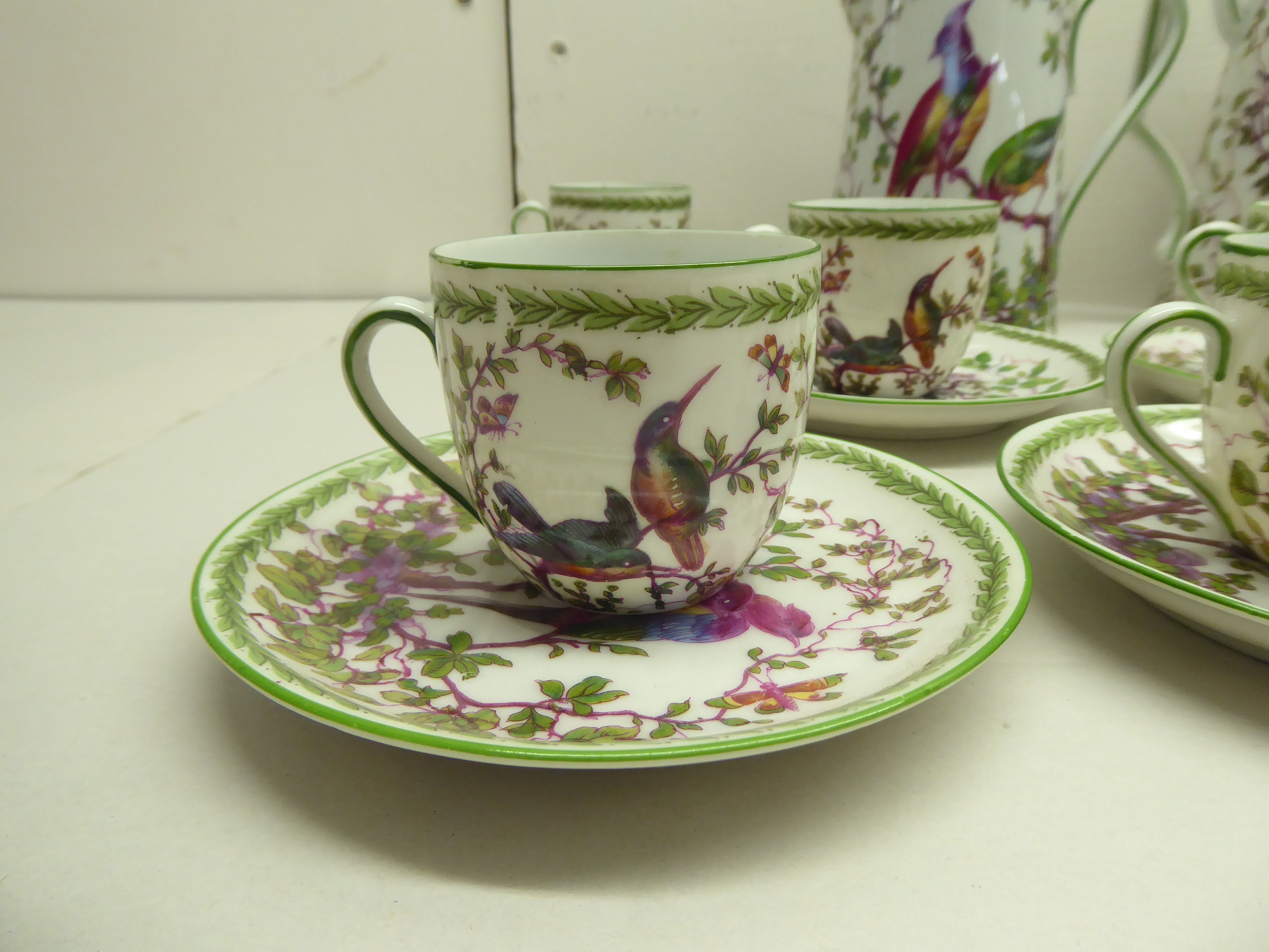 English china, decorated with birds and foliage  comprising a tea and coffee pot with ten cups and - Image 2 of 6