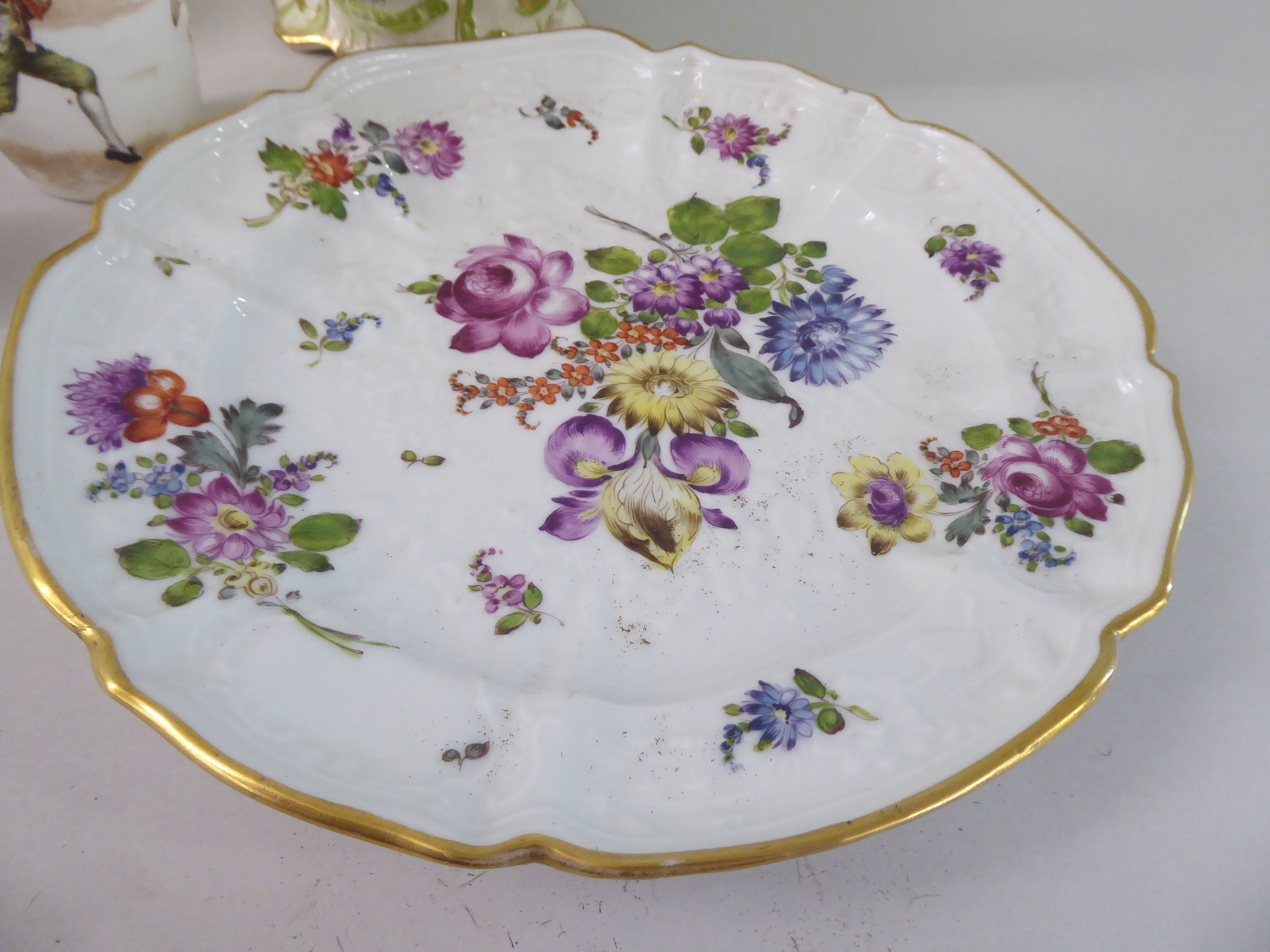 Ceramics: to include a late 19thC German porcelain plate, decorated with flora  9"dia - Image 2 of 7