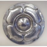 A Pewtal dish with a depressed centre, the wide rim ornamented in Art Nouveau inspired designs  15"