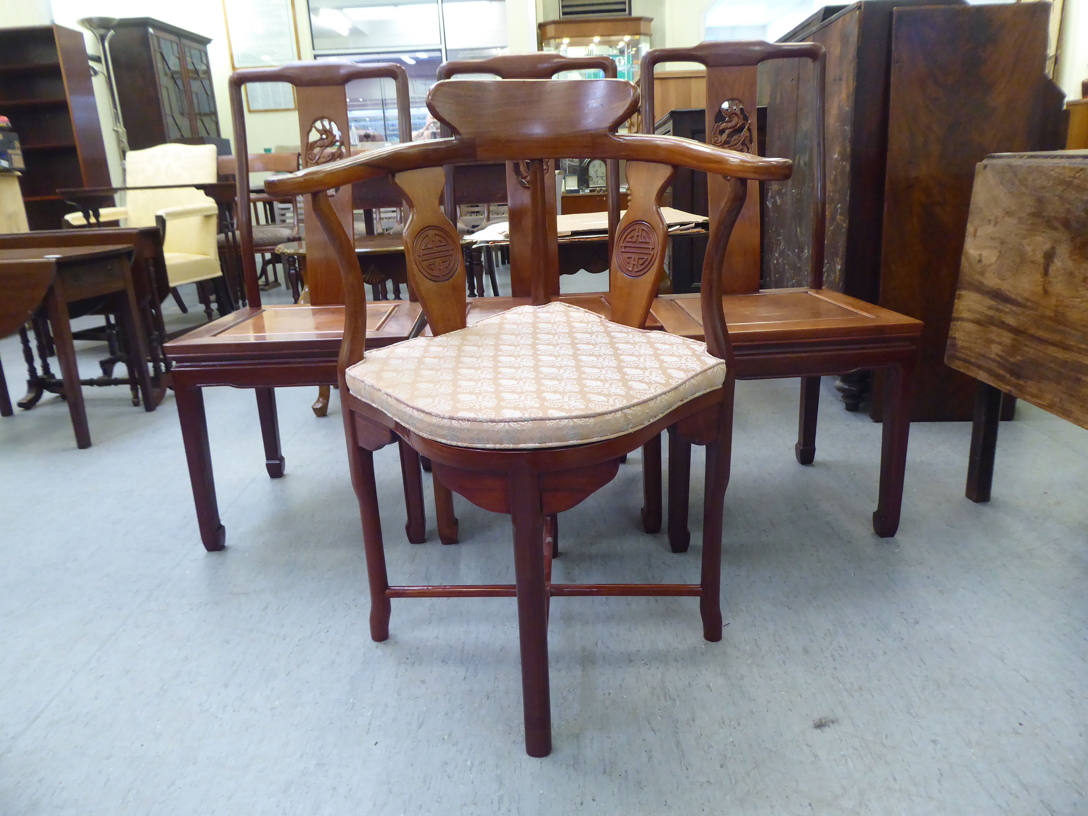 A set of seven modern Chinese, rosewood framed dining chairs, each with a dragon carved splat, - Image 4 of 5