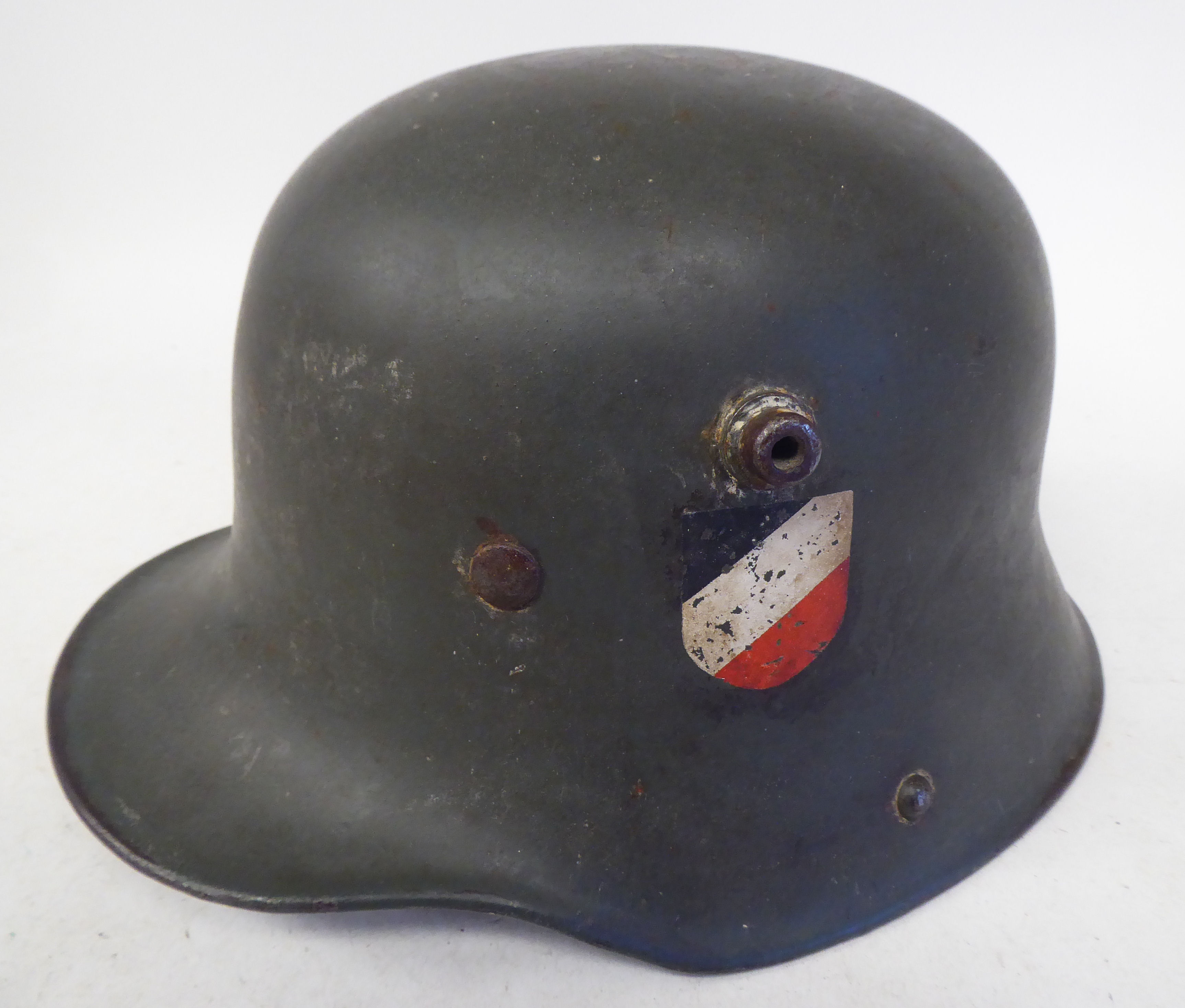 A German Great War military, steel helmet used by the SS in World War II with a hide liner and two - Image 2 of 4