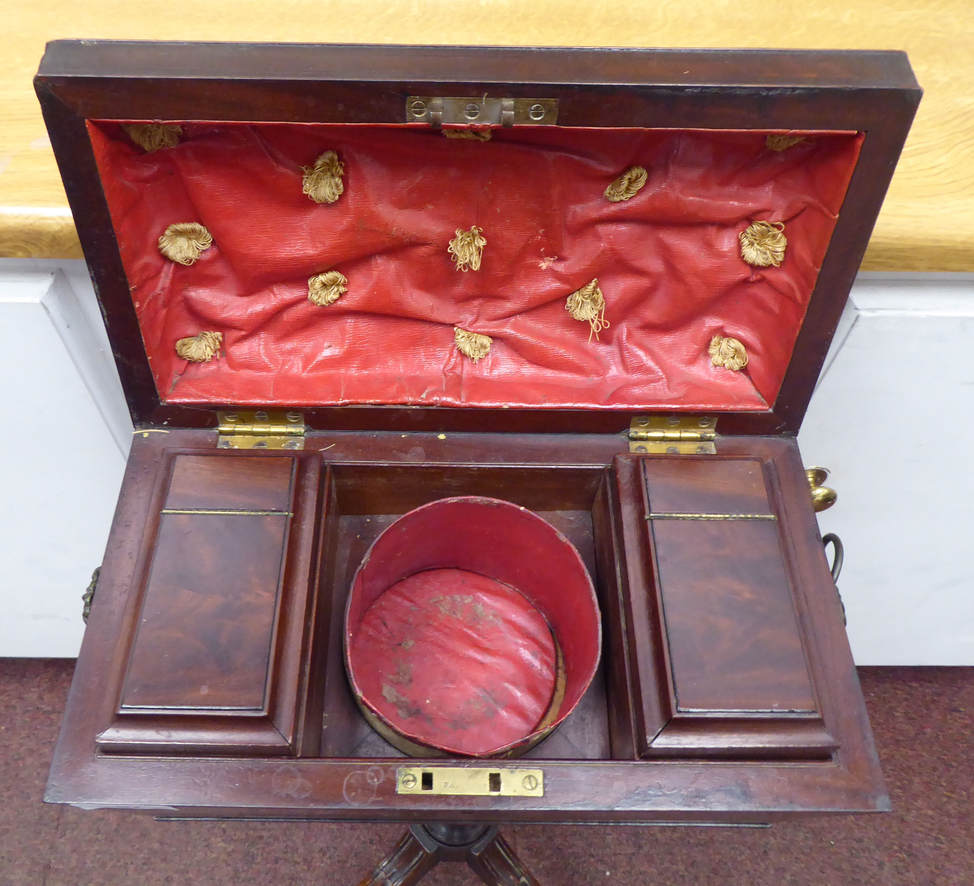 An early 19thC mahogany veneered tea casket of sarcophagus form, the hinged lid enclosing a pair - Image 3 of 5