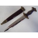 A German Army Stormtrooper presentation dagger with gilded emblems and mounts and a waisted