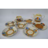 Clarice Cliff Bizarre Royal Staffordshire/Newport Pottery, Crocus pattern teaware, viz. a teapot;