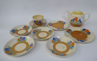 Clarice Cliff Bizarre Royal Staffordshire/Newport Pottery, Crocus pattern teaware, viz. a teapot;
