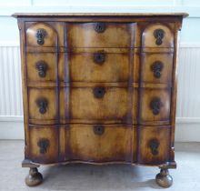 An early 20thC Continental walnut moulded block front chest, comprising four graduated long