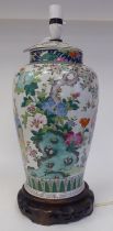 A late 19th/early 20thC Chinese porcelain table lamp of covered, baluster vase design, decorated