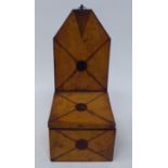 An early 19thC treen satinwood wall hanging salt box with an extended backplate, over an angled