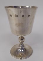 A silver goblet, the bucket shaped bowl over a baluster pedestal and domed foot  Asprey & Co  London