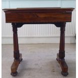 A William IV rosewood reading table with a hinged top, over a height adjustable lectern, on a