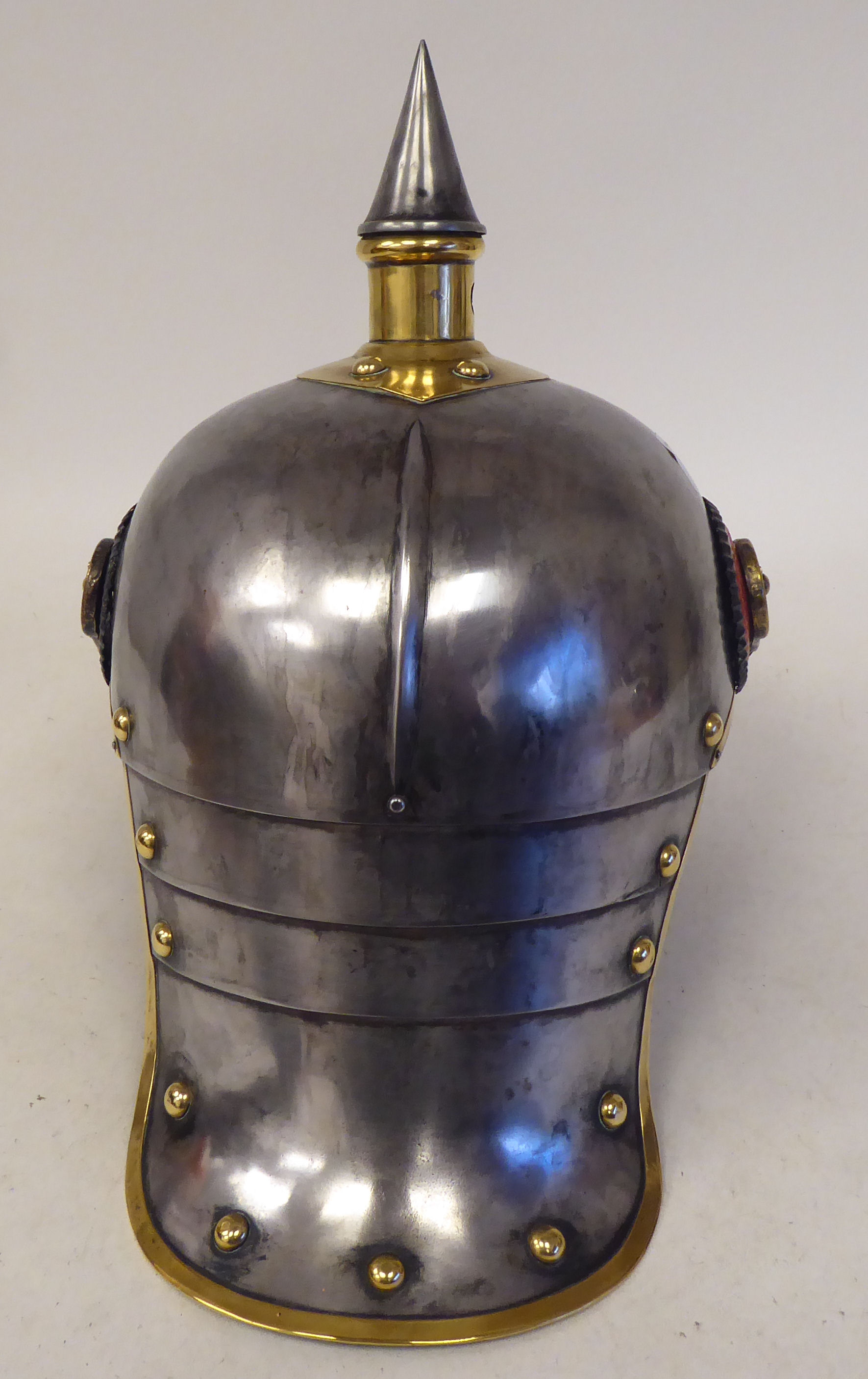 A German Great War spiked, polished steel and brass cavalry helmet with a hide liner and - Image 5 of 6