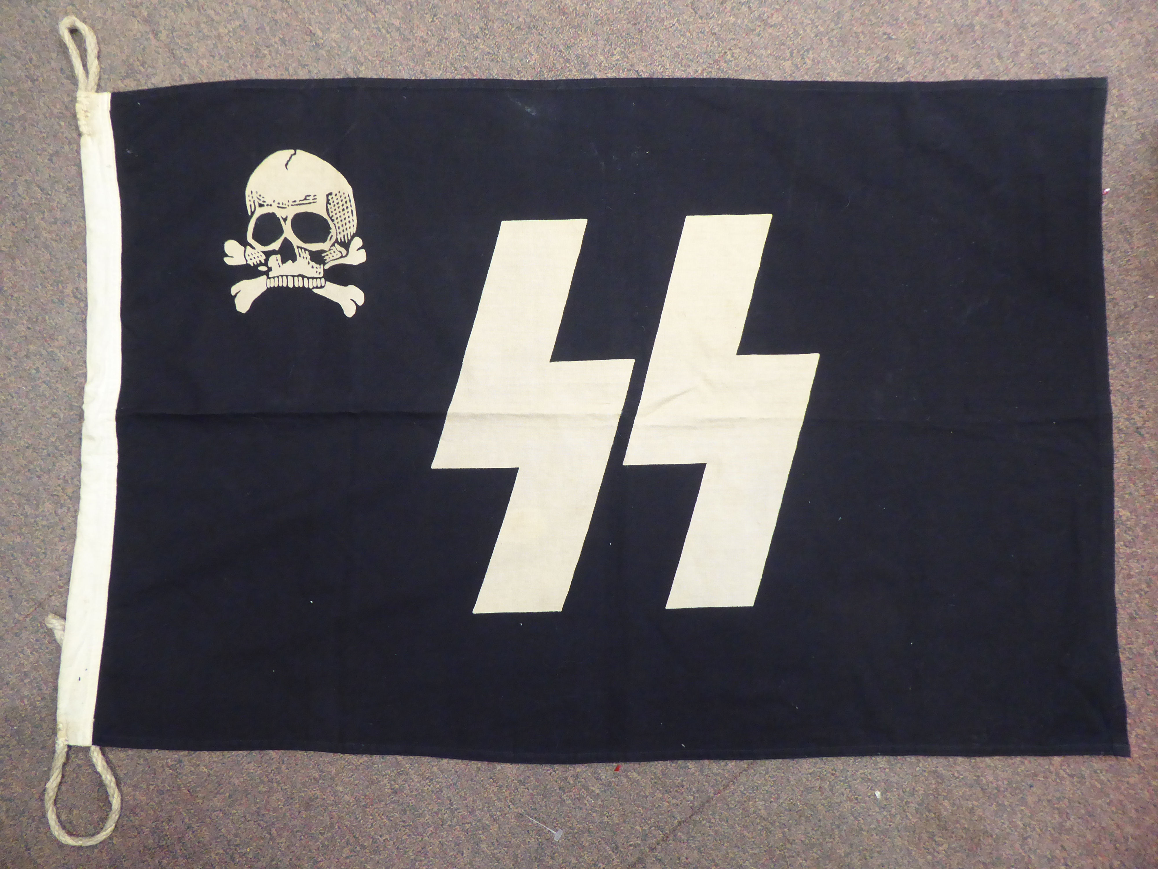 A German World War II era SS flag; and an album of miscellaneous German military orders/documents ( - Image 2 of 9