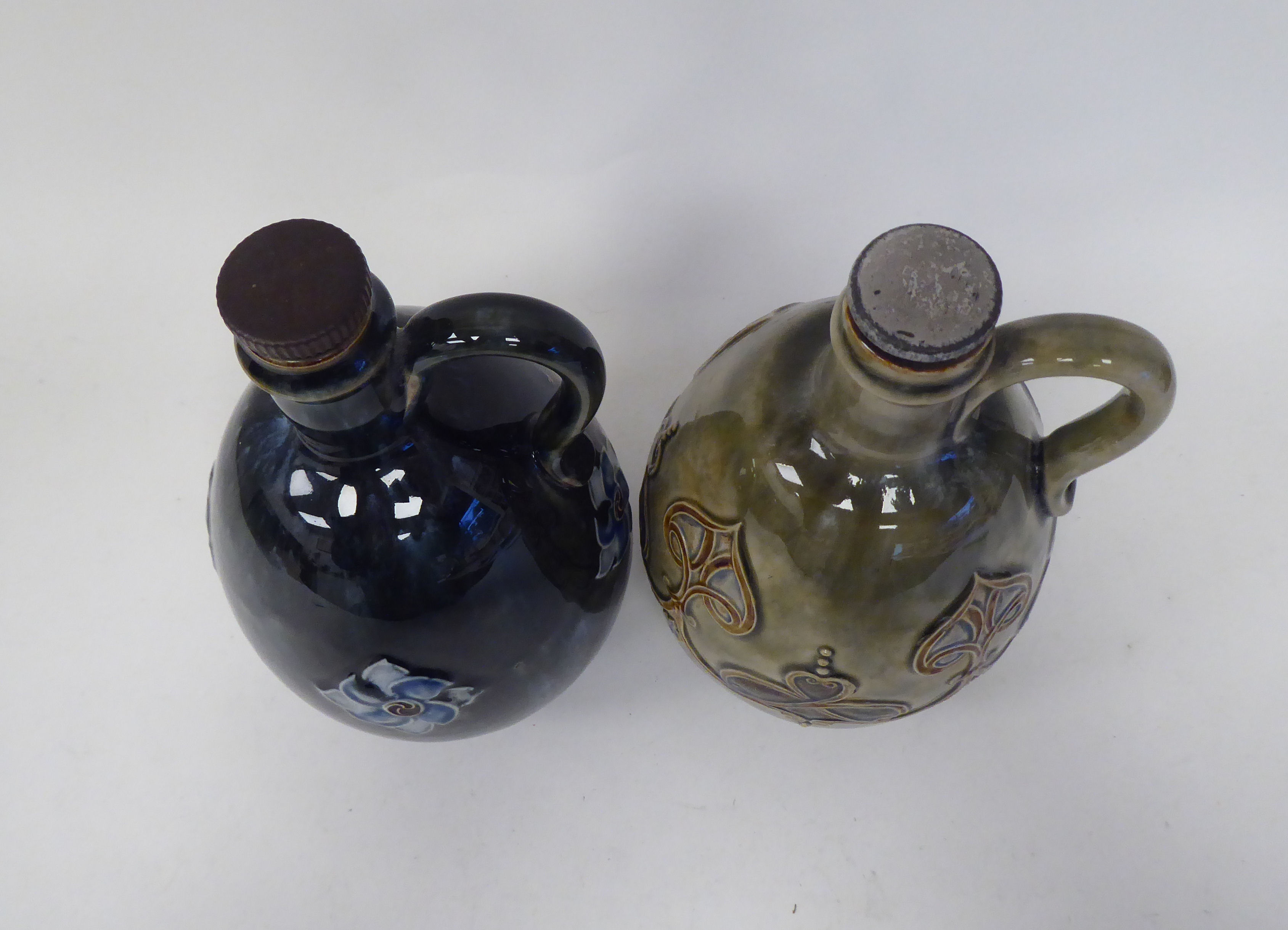 Two similar Royal Doulton stoneware ovoid shape liqueur decanters with strap handles, decorated in - Image 5 of 7