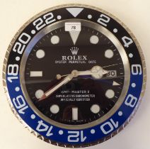 A dealer display, advertising wall timepiece for Rolex Oyster Perpetual Date; the movement faced
