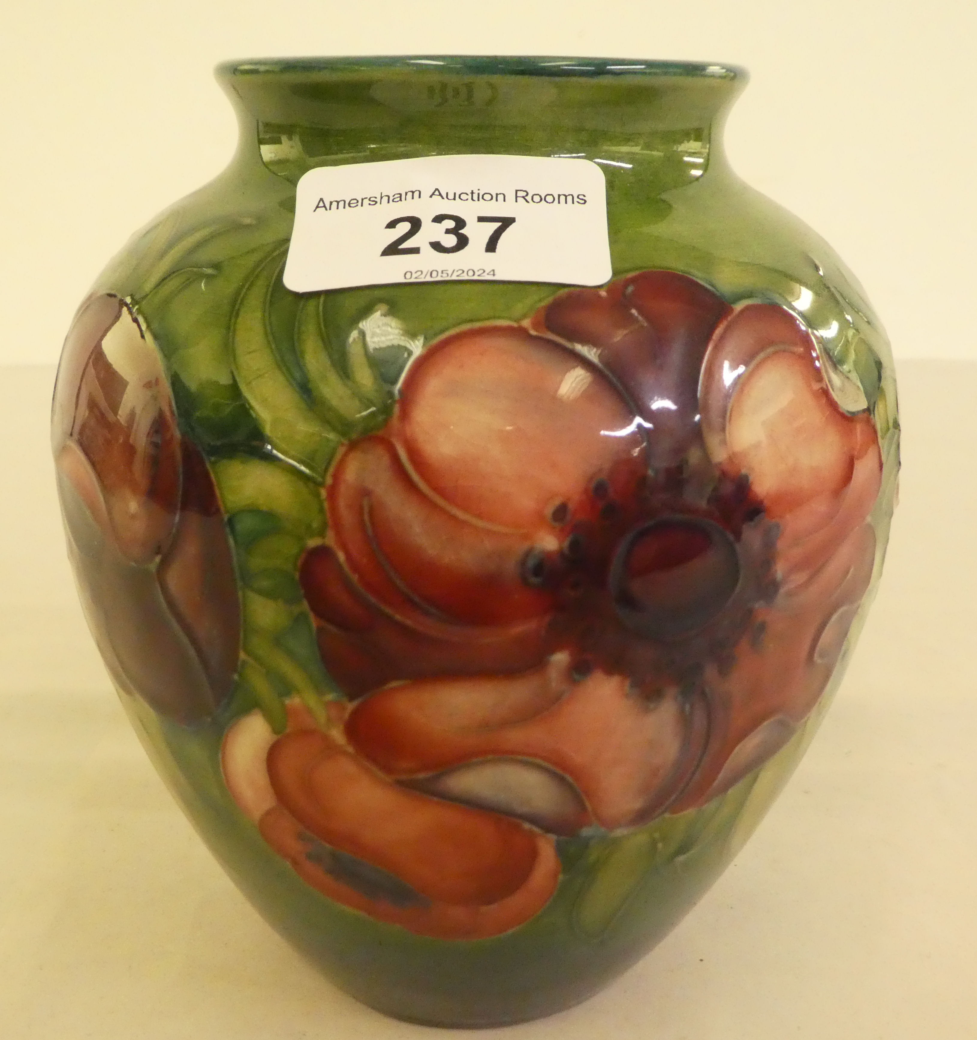 A Moorcroft pottery Anemone pattern vase  bears a painted signature  6"h