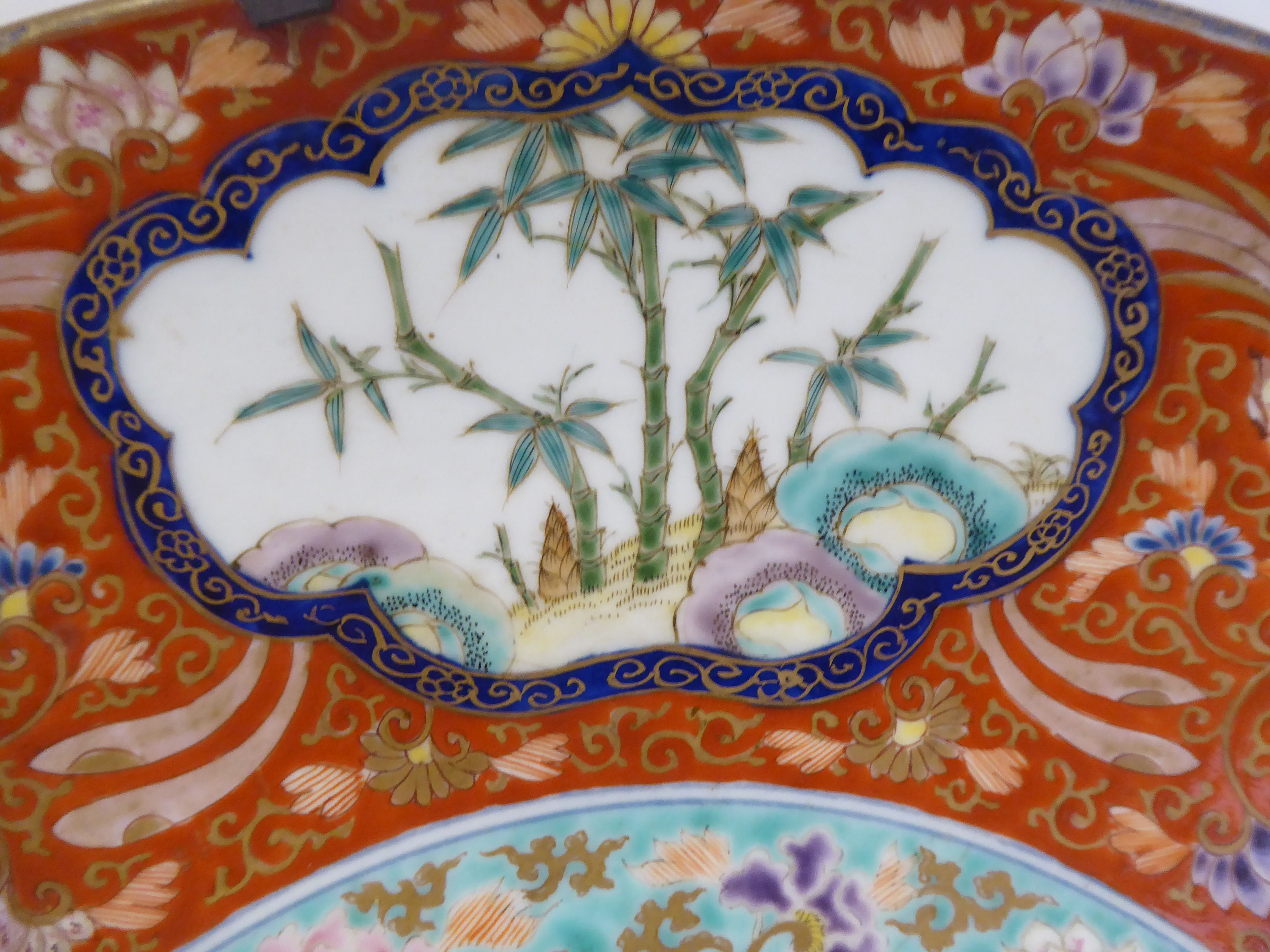 A 19thC Chinese porcelain charger, decorated to the centre with songbirds and flora and border - Bild 3 aus 6