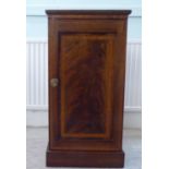 A late Victorian crossbanded and string inlaid mahogany pot cupboard, enclosed by a full-height