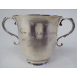 A silver twin handled, footed cup of bell design  Birmingham 1987  (approx. weight 4.5ozs)