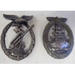 A German Kriegsmarine breast badge, by Schwerin of Berlin; and a Luftwaft Ack Ack breast badge (