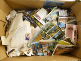 A miscellany of used and unused postage stamps, postcards and other themed collector's cards