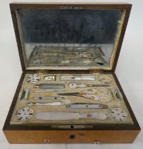A mid 19thC figured and bleached amboyna sewing box, comprising a full compliment of mother-of-pearl