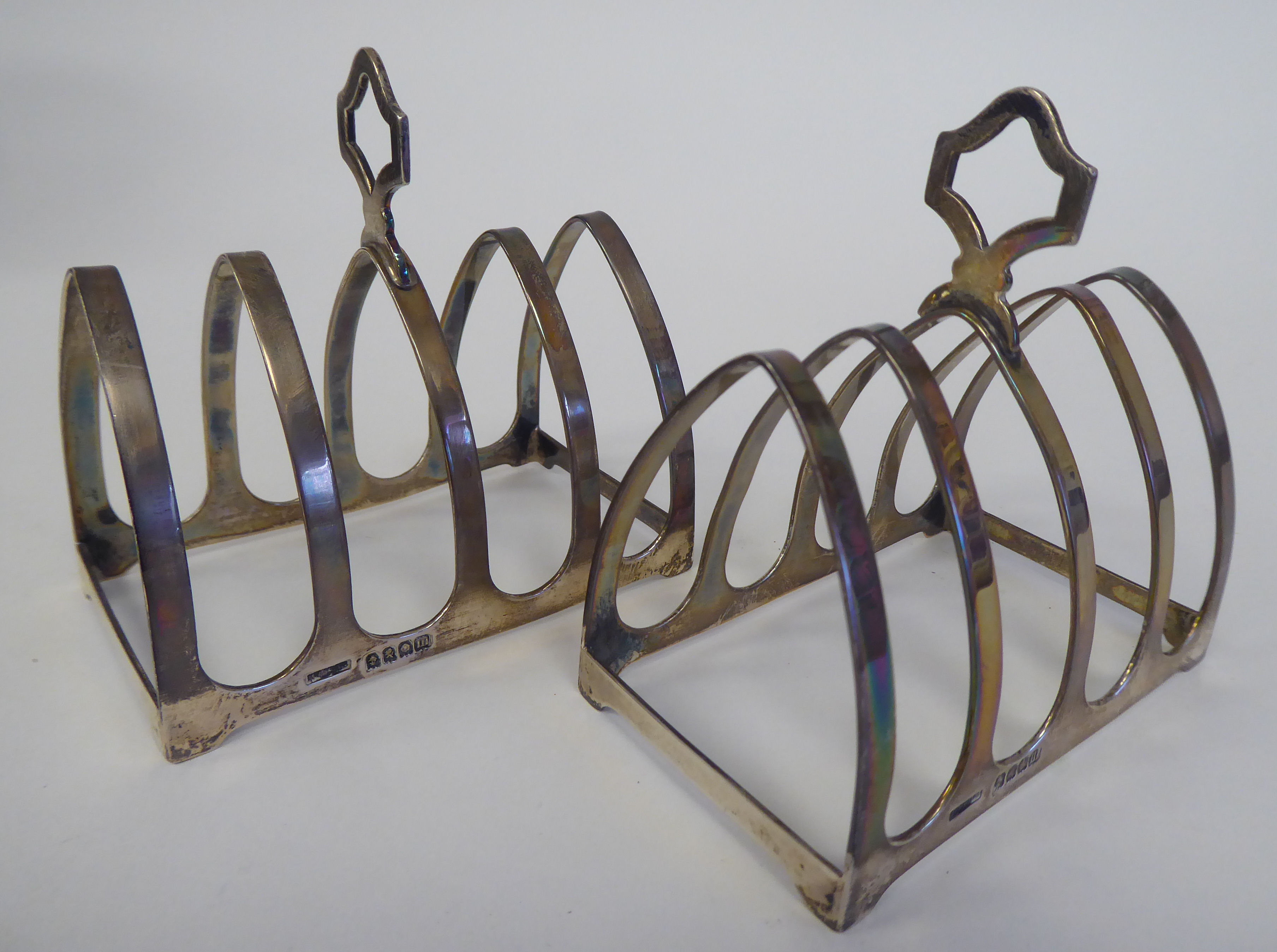 A pair of Scottish silver four division toastracks with central cut-out handles  MMcDS  Glasgow - Image 3 of 4