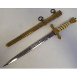 A German Third Reich period Naval officer's dress dagger with an eagle pommel, over the wire bound