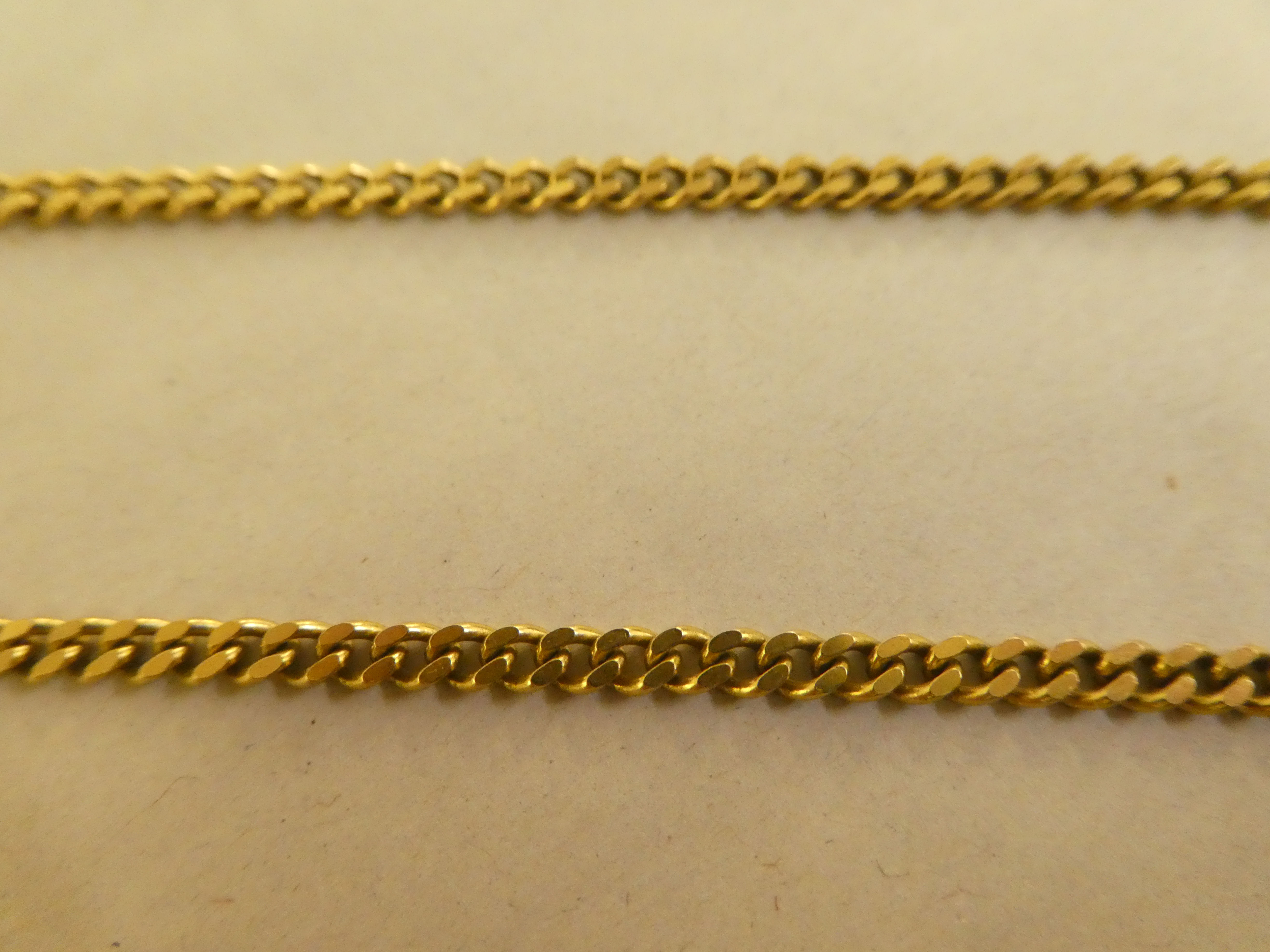 A 9ct gold flat curb link neckchain - Image 2 of 2
