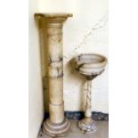 An onyx/marble pedestal  42"h; and an uplighter  28"h