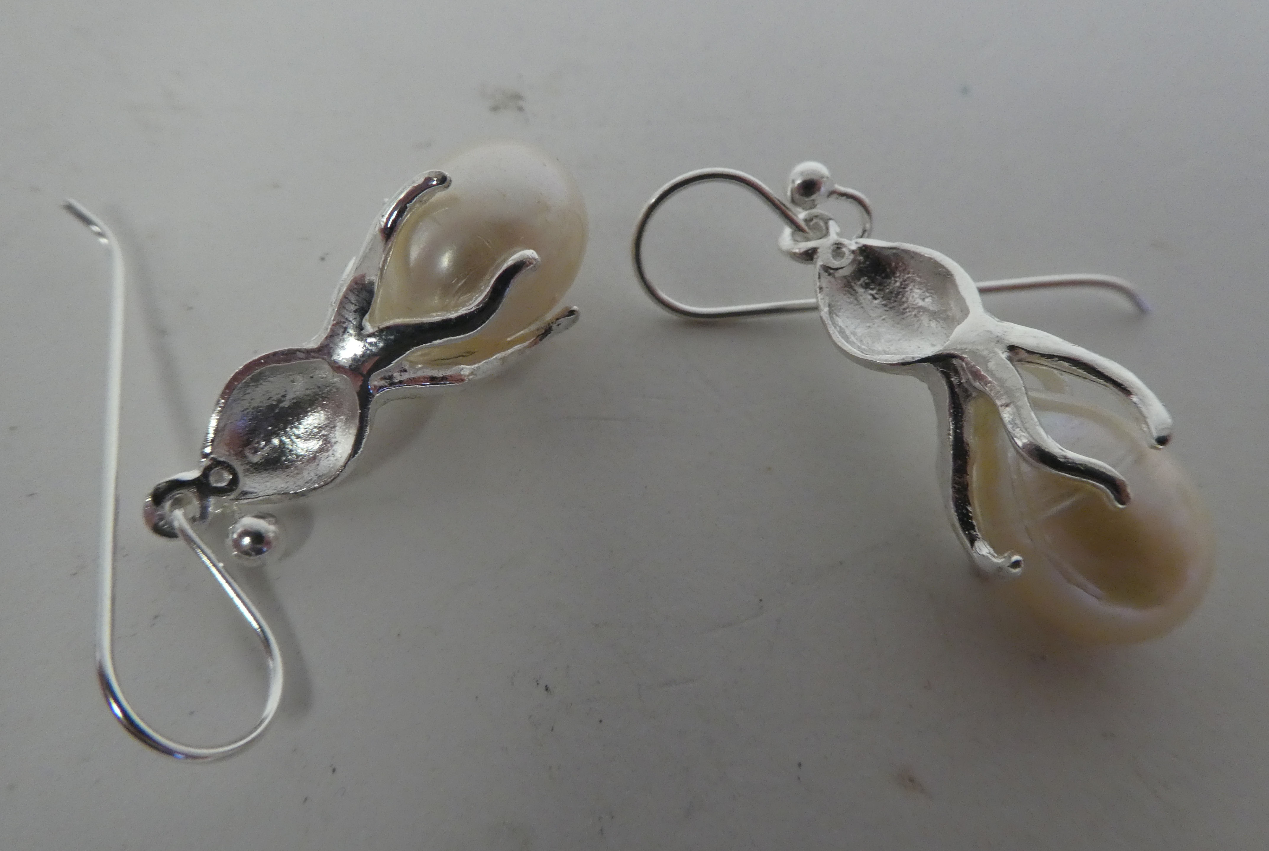 A pair of white metal and river pearl set pendant earrings - Image 2 of 2