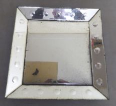 A modern shabby chic mirror with an angled border  16"sq