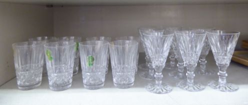 Two sets of eight Waterford crystal drinking glasses  3.5" & 4.5"h