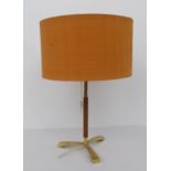 A 1970s teak and brass table lamp  16"h