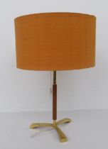 A 1970s teak and brass table lamp  16"h