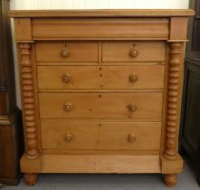 An early 20thC Scottish design, bleached pine six drawer dressing chest, on a plinth and turned feet