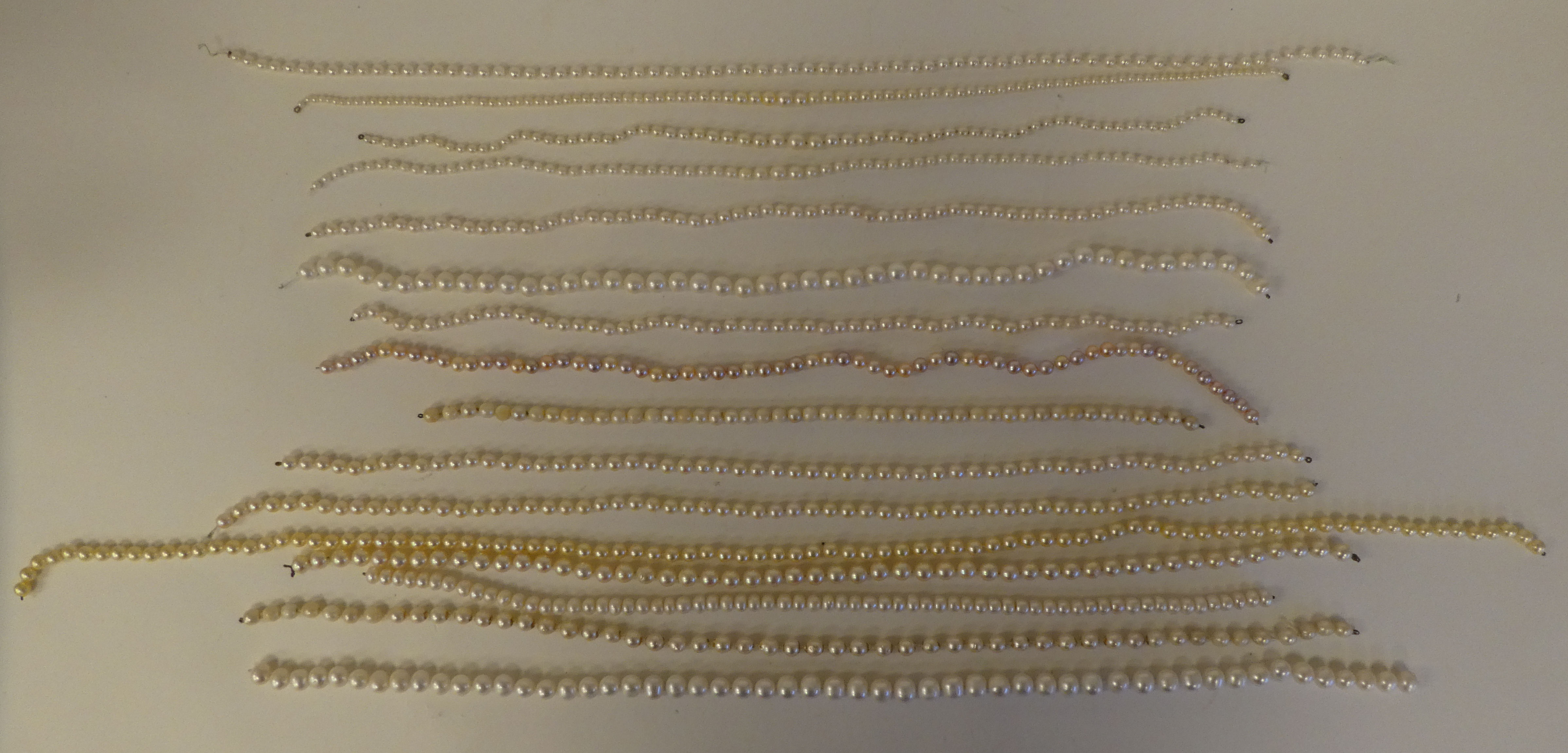 Single strand pearl necklaces